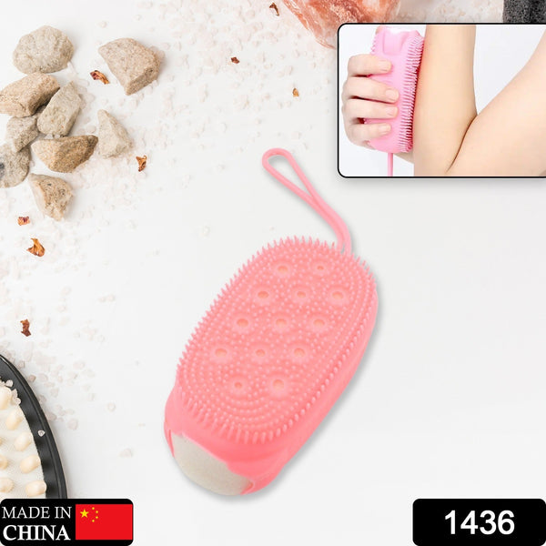 Close-up of the silicone bath brush showing the soft texture and double-sided design.