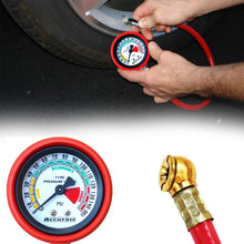 Tire inflator gauge with detailed design view.