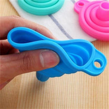 Multi-use silicone funnel for sauces and liquids.